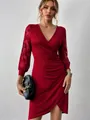 Detailed view of red V-neck dress featuring floral lace sleeves and ruched front design - S / Burgundy
