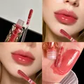 Ενυδατικό γυαλιστερό lip glaze στην απόχρωση #02 Icy Peach για ένα λαμπερό αποτέλεσμα - 02 Ice Λευκό Ροδάκινο