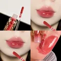Hydrating glossy mirror lip glaze in shade #02 Icy Peach for a radiant water-light finish - 02 Ice White Peach