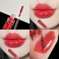 Mirror finish moisturizing lip glaze in #04 Icy Taro Mud for a hydrated natural look - 04 Ice Taro