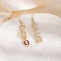 Elegant football theme earrings with rhinestone 'PLAY' and 'GAME' letter charms. - Letter Rhinestone Earrings (E8330)