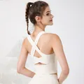 Breathable white sports bra featuring a cross-back design and wide straps for yoga fitness - S / Tops / Cream