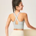 Reggiseno sportivo verde chiaro traspirante con incrocio sulla schiena per lo yoga - Taglia M / Top / Blu