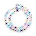 Detail view of colorful flat round evil eye glass beads for DIY jewelry making crafts - Macaron Color
