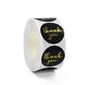 Roll of premium black round thank you stickers featuring elegant gold foil script design - Style 10 (Gold Stamping)