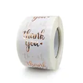 Roll of white circular adhesive labels with rose gold foil thank you script - Style 8 (Gold Stamping)