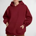Solid burgundy oversized hooded sweatshirt for women featuring a cozy kangaroo pocket - Burgundy