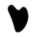 Herzförmiger schwarzer Obsidian Gua Sha Stein für Gesichtsmassage und Hautpflege. - Obsidian Herz Gua Sha Brett