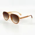 Detail of retro aviator sunglasses with amber frames and gradient lenses. - Aviator Style (1875) / Transparent Tea Frame Gradient Tea Lens