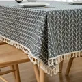 Mantel moderno de lino gris con estampado geométrico y flecos decorativos suaves - Flecha Gris Patrón Blanco (Borde de Borlas)