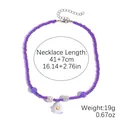 Paarse kralen Halloween ketting met schattige spook hanger en gouden hart detail - Paars (Geesthanger)
