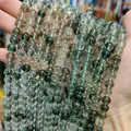 Macro view of green phantom style glass beads strands for DIY jewelry making accessories - Green