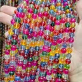 Detailed close-up view of vibrant multi-color glass phantom crystal beads for DIY jewelry - Multicolor 2
