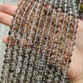 High-quality close-up of translucent brown phantom glass beads for DIY jewelry crafts - Brown
