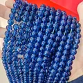 Close-up of translucent blue phantom glass beads for DIY jewelry and hand-beading crafts - Dark Blue