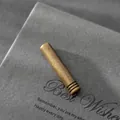 Primer plano de la tapa del extremo de la cuerda cilíndrica de bronce antiguo con ranuras - Cilíndrico con Triple Anillo Decorativo (D1) / 30mm x 6mm / Bronce Antiguo