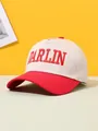 Detail showing red DARLIN embroidery on a cream and red retro trucker style baseball cap - Adjustable / Red