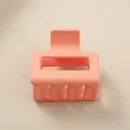 Minimalistische 5cm quadratische matte Haarklammer in Pfirsichrosa für Damenfrisuren. - Großpackung / Hellorange