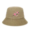 Macro detail of cherry blossom embroidery on a vintage khaki outdoor bucket sun hat - Khaki