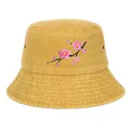 Detailed view of yellow bucket hat featuring delicate cherry blossom embroidery - Yellow / Adjustable