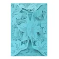 Intricate macro view of a light blue laser cut floral pattern on a wedding invitation - Tiffany Blue