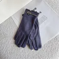 Elegant grey touchscreen gloves with houndstooth trim and stylish decorative buckle detail. - Gray