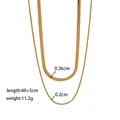 Gold-colored double-layered snake bone chain necklace with length and weight details - Blade + Snake Chain Necklace / Gold