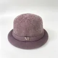 Close-up view of a mauve fuzzy winter bucket hat featuring a knitted brim and M logo detail - M (56-58cm) / Taro Purple (With M Logo)