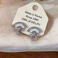 Elegant silver needle fan-shaped stud earrings featuring zircon ribbon detail and teardrop pendant - 2 Ear Clips - Silver