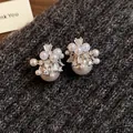 Exquisite cluster pearl earrings with cubic zirconia star design and gold plating finish - 47 Silver Needles - Silver