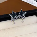 Exquisite star stud earrings with black enamel and sparkling cubic zirconia stones - 37 Silver Needles - Black