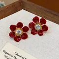 Elegant red enamel flower stud earrings with a sparkling zircon center and gold plating - 30 Silver Needles - Gold - Red
