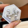 Elegant silver-tone multi-pearl stud earrings featuring a luxury star cluster design - 54 Silver Needle - Silver - White