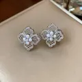 Elegant gold-plated flower stud earrings with intricate filigree and pearls - 4 Ear Clips - Silver