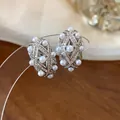 Elegant oval star stud earrings with white pearls and zircons in silver finish - 11 Ear Clips - Silver