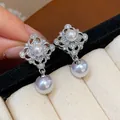 Elegant silver-plated cubic zirconia square stud earrings with dangling white pearl - 44 Silver Needles - Silver - White