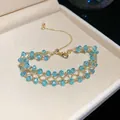 Elegantes blaues Kristallperlen-Mesh-Armband mit goldfarbenen Akzenten in Luxusbox - Netzartiger Durchbrochener Perlenstil (49#)