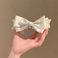 Elegant white satin hair clip with black polka dots in a chic layered bow design - 38# Twist Clip - White