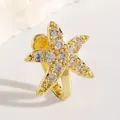 Clip per naso a forma di stella marina in rame dorato con zirconi brillanti incastonati - Stile Stella Marina (M-020) / Taglia unica / Oro