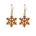 Nahaufnahme roter Glitzer-Schneeflocken-Ohrringe mit Goldfinish für Weihnachten - Rote Schneeflocke
