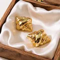 Elegant gold-plated stainless steel croissant stud earrings presented in a wooden gift box - Croissant Spiral Earrings