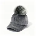 Macro view of grey winter baseball cap with rhinestone W and large faux fur pom-pom. - Adult Size (58cm Adjustable) / Gray