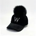 Detail view of stylish black velvet cap featuring a sparkling rhinestone letter W design - Adult Size (58cm Adjustable) / Black