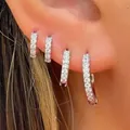 Elegant gold plated brass hoop earrings set with sparkling cubic zirconia in four sizes - Mixed Style / Silver