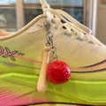 Mini baseball bat and red ball keychain pendant hanging on a colorful running shoe - 2CM Red Ball With Lobster Clasp