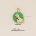 Hand-painted enamel white goose pendant charm with copper base and dimension markings. - Oval White Goose Pendant