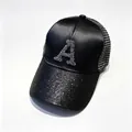 Close-up of black satin baseball cap with rhinestone letter A and sequined brim details. - Adult, Hat Circumference 58cm Adjustable / Black