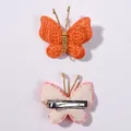 Set of two handmade crochet butterfly hair clips in soft orange and pink for baby girls - Orange (18)