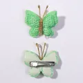 Handmade green knitted butterfly hair clips with gold wire detailing front and back view - Light Green (17)