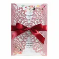 Pink glitter laser-cut wedding invitation card with red ribbon and elegant floral insert - Glitter Pink